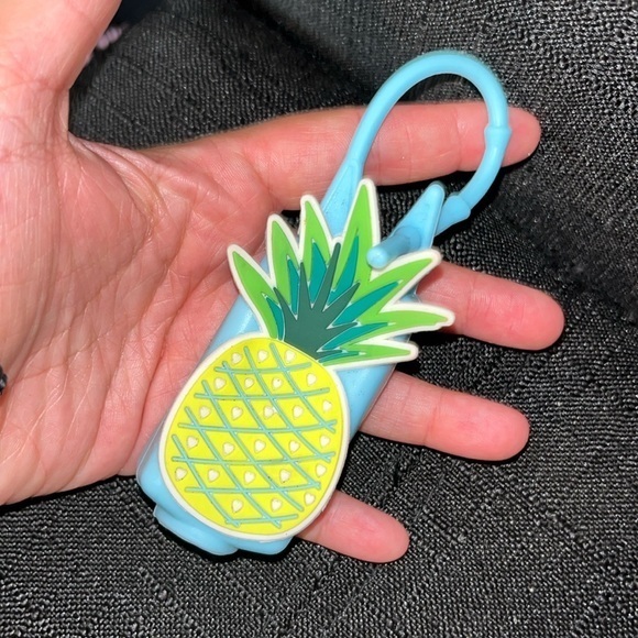 Accessories - Pineapple hand sanitizer holder not sure of the brand  more square shape.